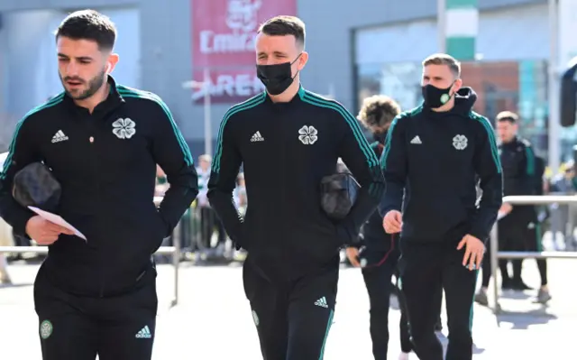 David Turnbull (centre) arrives at Celtic Park