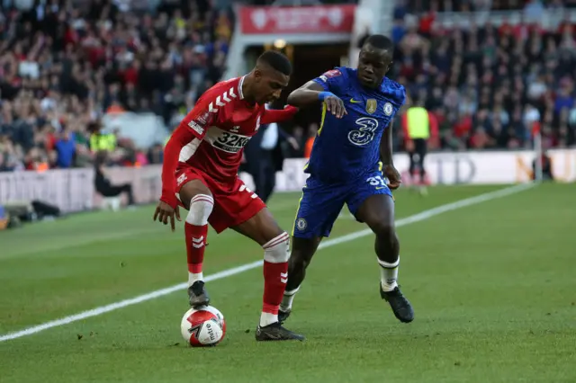 Middlesbrough's Isiah Jones challenges Chelsea's Malang Sarr