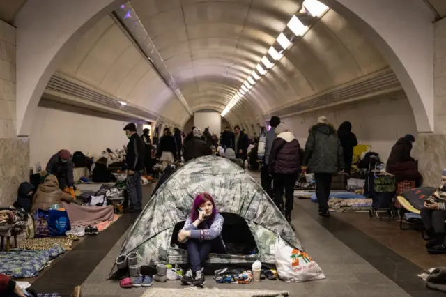 A woman in a tent in the Kyiv underground on Wednesday