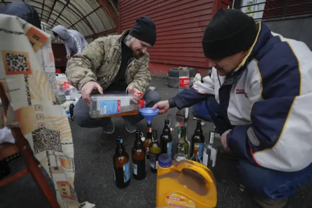 Ukrainians are also filling bottles with petrol on the streets of the country's capital city