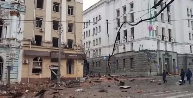 A street full of rubble in Kharkiv