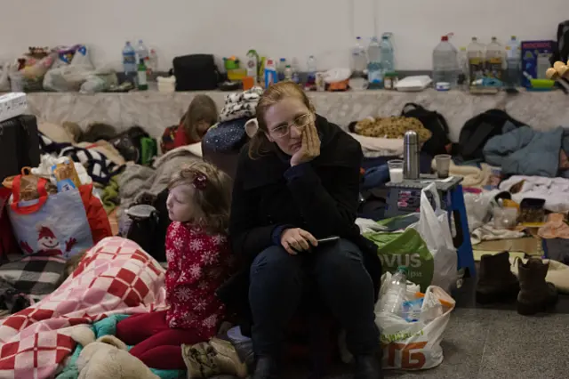 Civilians in bomb shelters in Kyiv