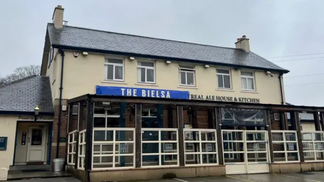 A picture of the pub with it's temporary sign