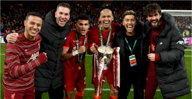 Liverpool players celebrate with Carabao Cup