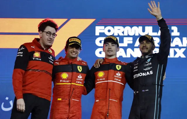 Ferrari drivers Charles Leclerc, Carlos Sainz and Mercedes' Lewis Hamilton complete the podium