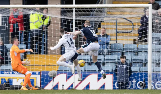 Dundee's Christie Elliott scores