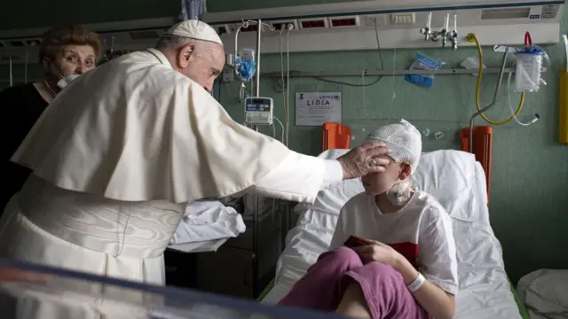 Pope Francis blesses an Ukrainian child receiving treatment at Bambino Gesù Pediatric Hospital