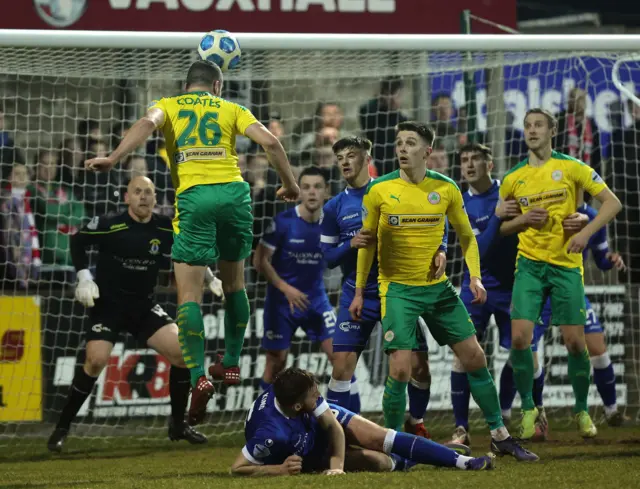 Colin Coates heads the ball