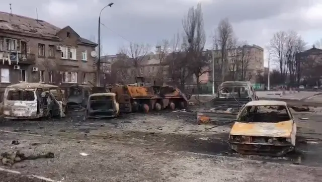 Destroyed buildings and vehicles after Russian attacks in Mariupol