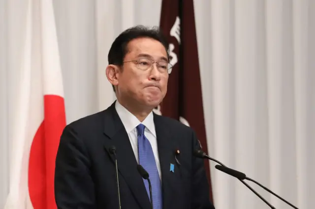 File Photo: Japanese prime minister Fumio Kishida stands at lectern