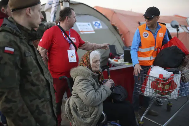 Civilians, fleeing from Ukraine due to ongoing Russian attacks, are seen after crossing the Medyka border in Przemysl, Poland