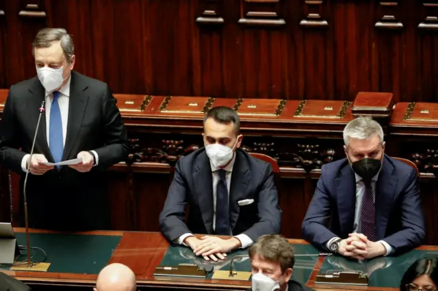 Italian Prime Minister Mario Draghi (L) next to Foreign Minister Luigi Di Maio and Defence Minister Lorenzo Guerini after Ukrainian President Volodymyr Zelenskiy's address to the Italian parliament via videolink in Rome, Italy, on 22 March 2022