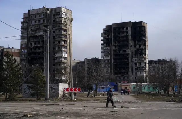 Civilians being evacuated along humanitarian corridors from the Ukrainian city of Mariupol besieged by Russian military and rebel forces, 20 March 2022