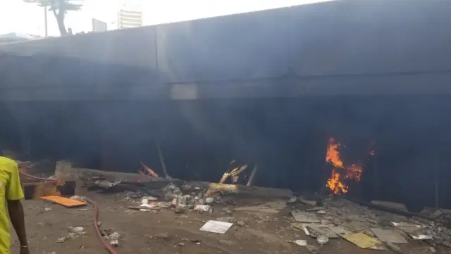 Scene of a fire under Eko Bridge in Lagos, Nigeria - 23 March 2022