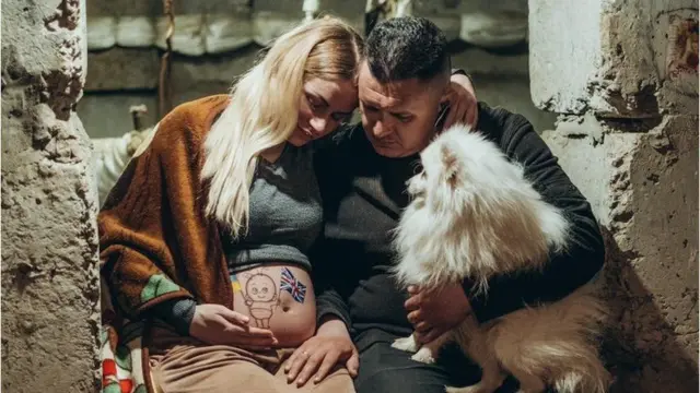 Ksenia with her husband and pet dog in a bomb shelter in Kremenchuck