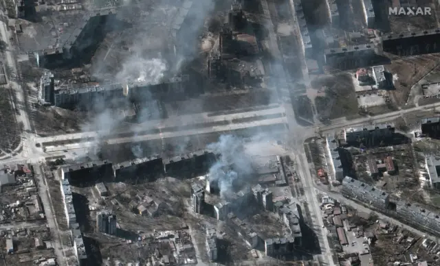 Maxar satellite imagery of additional burning residential apartment buildings in Mariupol, Ukraine. 22march2022