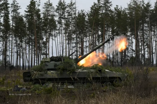 Ukrainian armed forces self-propelled howitzers fire at positions following Russia's invasion of Ukraine, near the settlement of Makariv, Ukraine, 6 March 2022