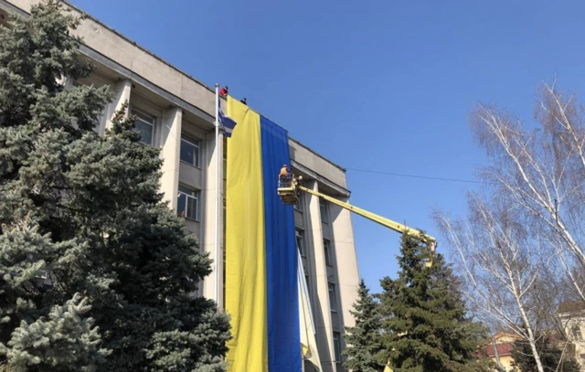 Ukraine flag over local council building in Kherson