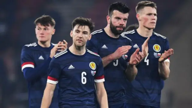 Scotland players applaud the Hampden crowd at full-time