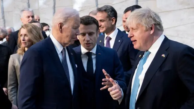 US President Joe Biden speaks with French President Emmanuel Macron and UK PM Boris Johnson