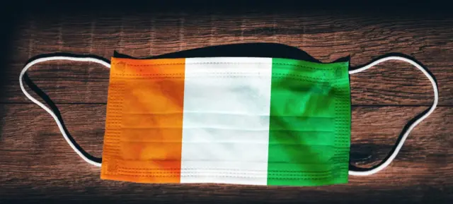 Face mask in the colours of the Ivorian flag