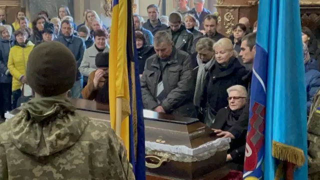 A funeral for a Ukrainian soldier killed in Kherson