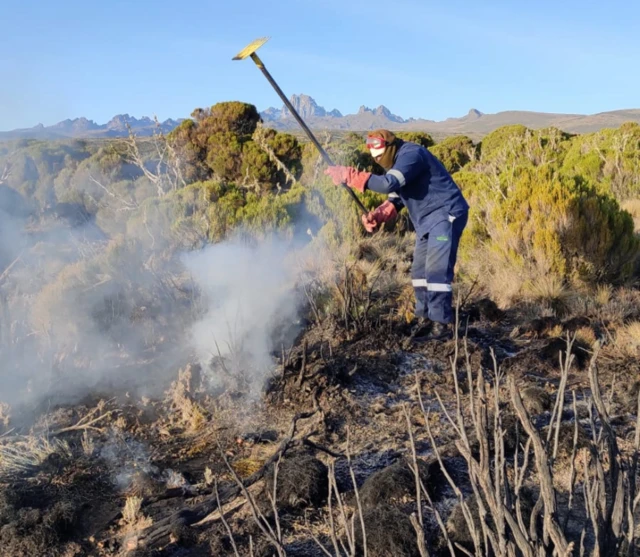 A firefighter on Mount Kenya - March 2022