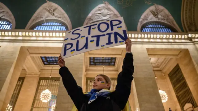 An activist in New York's Grand Central Terminal on Wednesday