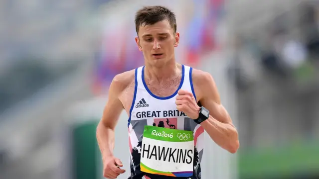 Derek Hawkins of Great Britain races to the finish line during the Men's Marathon on Day 16 of the Rio 2016 Olympic Games