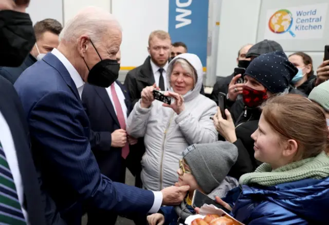 US President Joe Biden with Ukrainian refugees in Poland