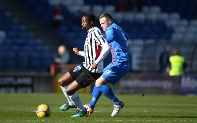 Dunfermline's Efe Ambrose against Inverness' Billy Mackay battle for the ball this afternoon