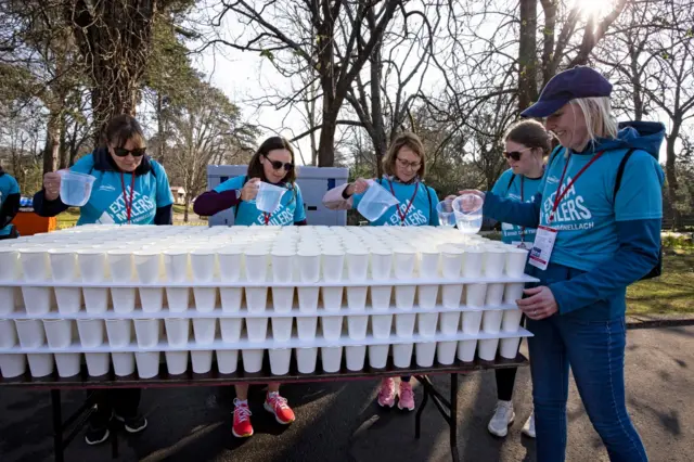 Volunteers prepare drinks in Roath Park