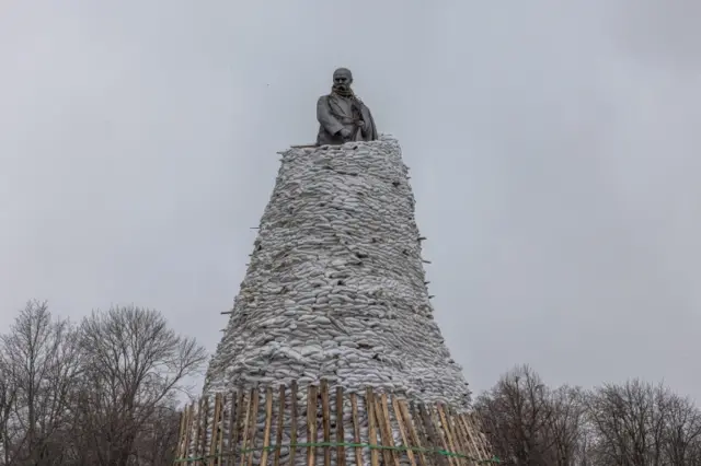 The statue of Taras Shevchenko surrounded with sandbags