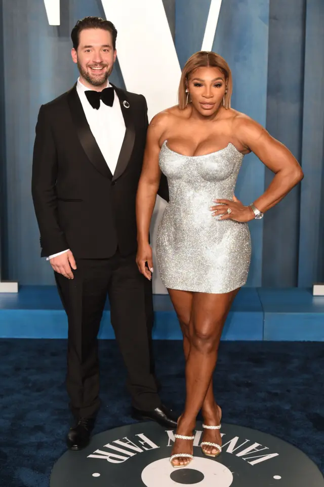 Tennis star Serena Williams wore a metallic mini dress as she arrived with husband Alexis Ohanian