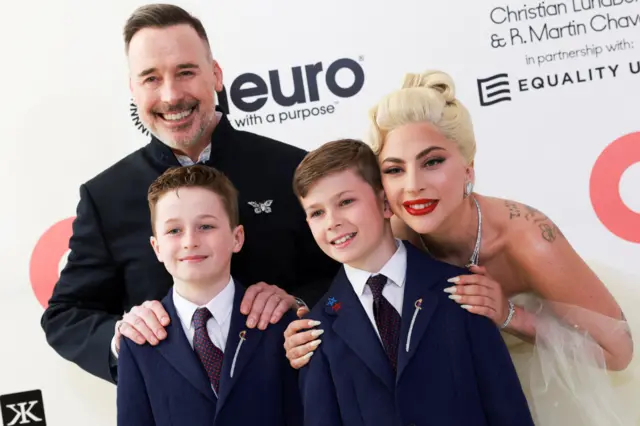 David Furnish, Lady Gaga, Zachary Jackson Levon Furnish-John and Elijah Joseph Daniel Furnish-John attend the Elton John Aids Foundation Academy Awards viewing party