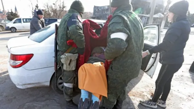 Elderly woman evacuated from Mariupol on Sunday 27 March