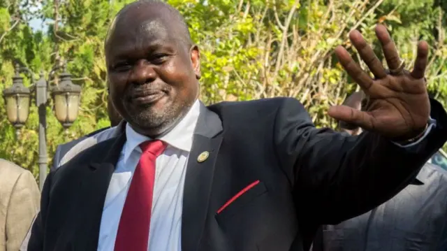 Riek Machar gestures at a past event