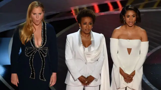 Amy Schumer (L) Wanda Sykes (C) and US actress Regina Hall