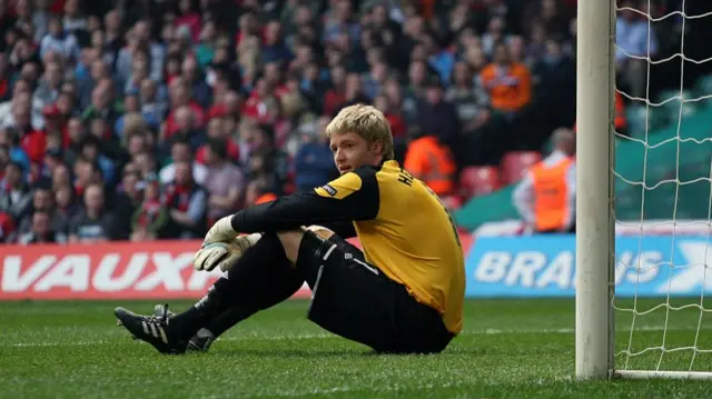 Wayne Hennessey shows his dejection after Frank Lampard's penalty gives England a 1-0 lead in a Euro 2012 qualifier