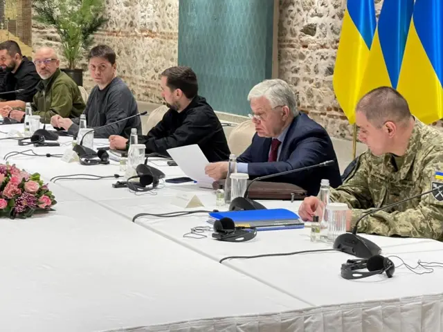 Members of the Ukrainian delegation attend the talks with Russian negotiators