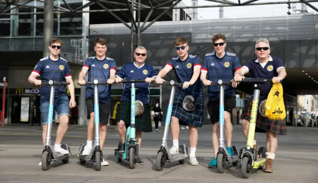 Scotland fans on scooters