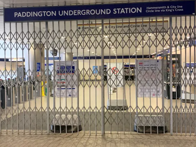 Signs at Paddington Station in London during the strike