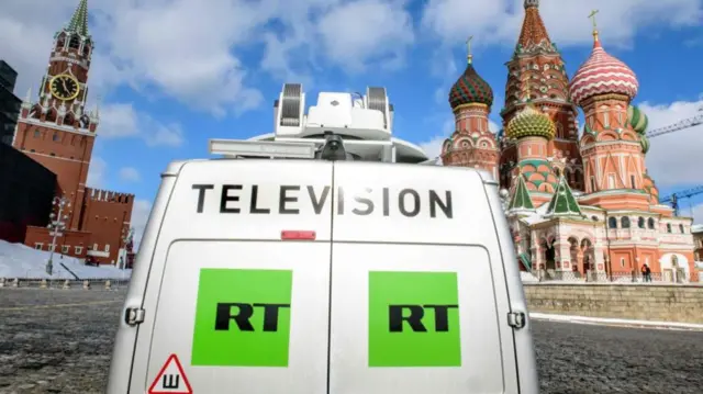 A Russia's state-controlled Russia Today (RT) television broadcast van
