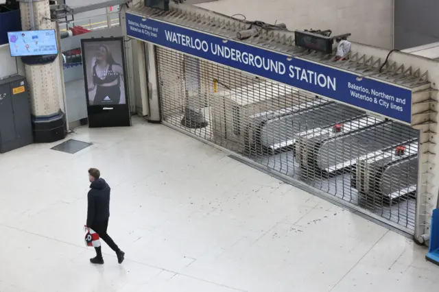A commuter at Waterloo station in London during the strike