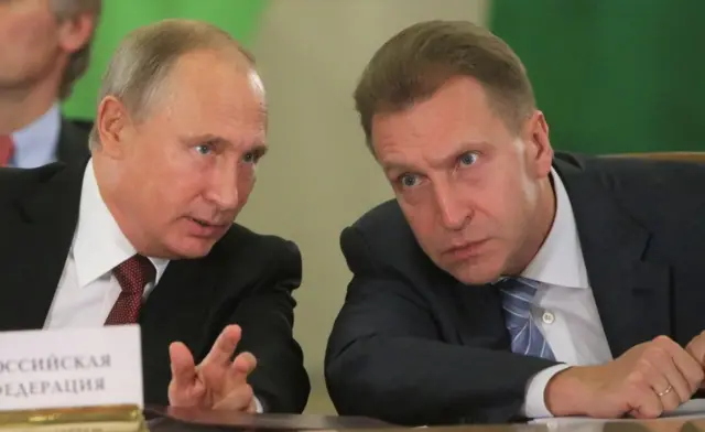 Vladimir Putin speaking to Igor Shuvalov