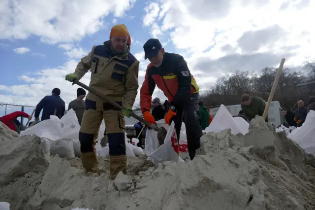 Residents of Odesa fill construction bags with sand to defend the city