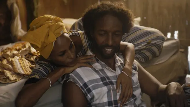 A woman and a man sitting together