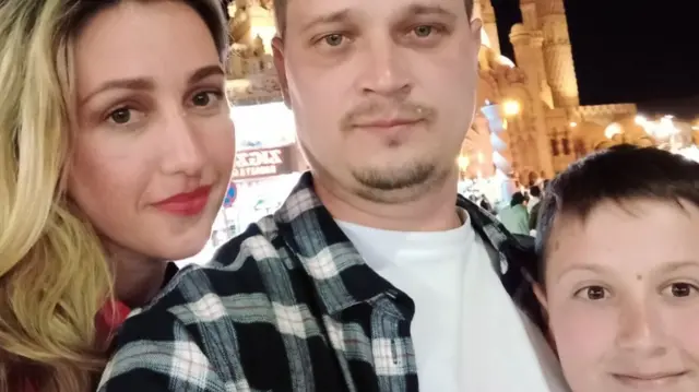 Natalia Miroshnikova with her husband and son