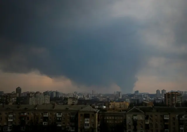 Smoke rises above Kyiv