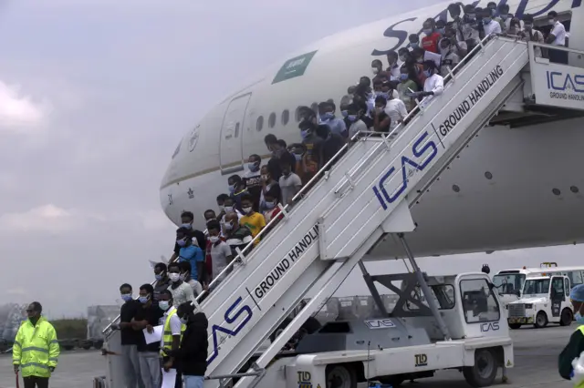 Ethiopian migrants stranded in Saudi Arabia being brought back to Bole International Airport in Addis Ababa, Ethiopia on July 07, 2021